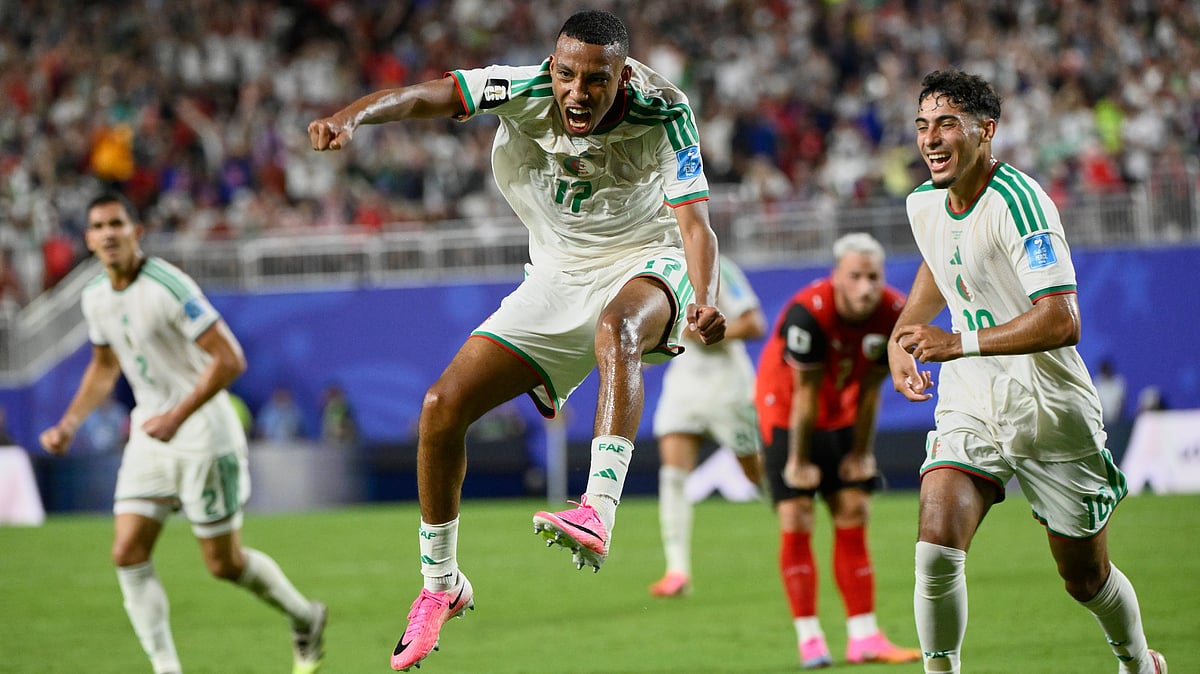 Algeria's Rafik Belghali (17)celebrates after scoring his team's first goal during the World Cup Group J soccer match between Algeria and Austria in Kansas City, Mo., Saturday, June 27, 2026 - (AP Photo/Reed Hoffmann)
