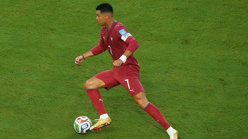 Portugal's Cristiano Ronaldo (7) controls the ball during the World Cup Group K soccer match between Colombia and Portugal in Miami Garden. - Marta Lavandier/AP Photo