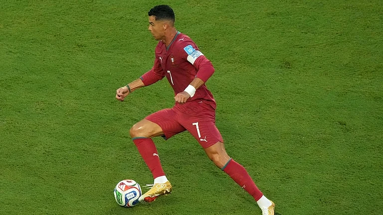 Portugal's Cristiano Ronaldo (7) controls the ball during the World Cup Group K soccer match between Colombia and Portugal in Miami Garden. - Marta Lavandier/AP Photo