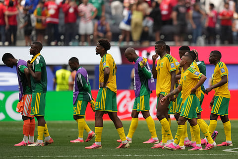 South Africa players leave the field after the World Cup round of 32 soccer match against Canada in Inglewood