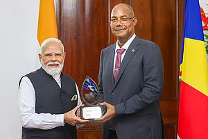 | Photo: PMO via PTI : In this image received on June 28, 2026, Prime Minister Narendra Modi receives the 'Guardian of the Blue Horizon' from Seychelles President Patrick Herminie, in Seychelles.