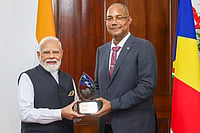 Day In Pics: June 28, 2026 | Photo: PMO via PTI : In this image received on June 28, 2026, Prime Minister Narendra Modi receives the 'Guardian of the Blue Horizon' from Seychelles President Patrick Herminie, in Seychelles.