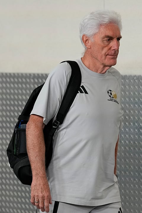 South Africa head coach Hugo Broos arrives for the World Cup round of 32 soccer match against Canada in Inglewood