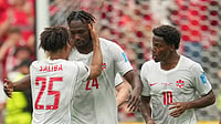 Canada Vs South Africa LIVE Score, FIFA World Cup: Les Rouges Challenge Bafana Bafana In Round Of 32 Showdown AP Photo/Abbie Parr : Canada's Promise David (24) celebrates with teammates Nathan Saliba (25) and Jonathan David (10) during the World Cup Group B soccer match between Switzerland and Canada in Vancouver.