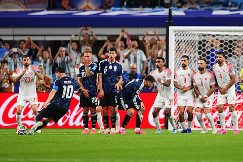 Argentina's Lionel Messi, second from left, scores his side's third goal on a free kick during the World Cup Group J soccer match against Jordan in Arlington, Texas, near Dallas, Saturday, June 27, 2026