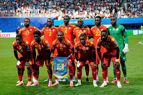 Starting Congo players pose for group photograph prior to the World Cup Group K soccer match between DR Congo and Uzbekistan in Atlanta, Saturday, June 27, 2026.