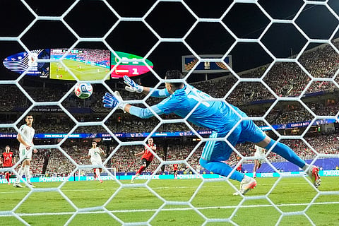 Austria's Marcel Sabitzer (9) scores their second goal past Algeria goalkeeper Oussama Benbot (16) during the World Cup Group J soccer match between Algeria and Austria in Kansas City, Mo., Saturday, June 27, 2026.