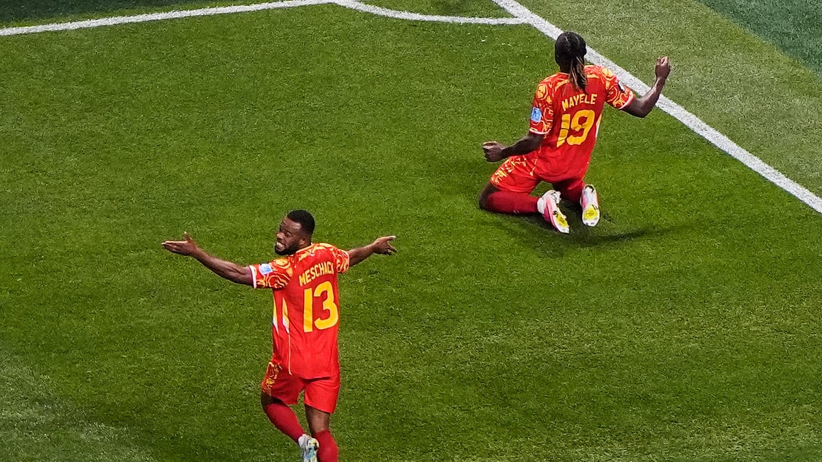 Congo's Fiston Mayele (19) celebrates with Meschack Elia (13) after scoring their second goal during the World Cup Group K soccer match between DR Congo and Uzbekistan in Atlanta, Saturday, June 27, 2026. - (AP Photo/Mike Stewart)