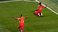 (AP Photo/Mike Stewart) : Congo's Fiston Mayele (19) celebrates with Meschack Elia (13) after scoring their second goal during the World Cup Group K soccer match between DR Congo and Uzbekistan in Atlanta, Saturday, June 27, 2026.