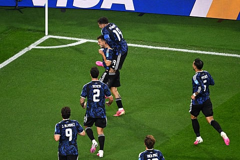 Argentina's Giovani Lo Celso (11) celebrates scoring their first goal with Nicolas Otamendi (19) during the World Cup Group J soccer match between Jordan and Argentina in Arlington, Texas, near Dallas, Saturday, June 27, 2026