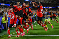 (AP Photo/Reed Hoffmann) : Austria's players celebrates after Austria's Sasa Kalajdzic (14) scored to tie the match during the World Cup Group J soccer match between Algeria and Austria in Kansas City, Mo., Saturday, June 27, 2026