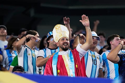 A fan dressed as Pope cheer prior to the World Cup Group J soccer match between Jordan and Argentina in Arlington, Texas, near Dallas, Saturday, June 27, 2026