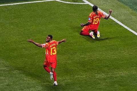 Congo's Fiston Mayele (19) celebrates with Meschack Elia (13) after scoring their second goal during the World Cup Group K soccer match between DR Congo and Uzbekistan in Atlanta, Saturday, June 27, 2026.