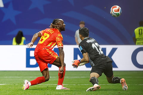 Congo's Fiston Mayele (19) scores their second goal against Uzbekistan goalkeeper Abduvohid Nematov (12) during the World Cup Group K soccer match between DR Congo and Uzbekistan in Atlanta, Saturday, June 27, 2026.