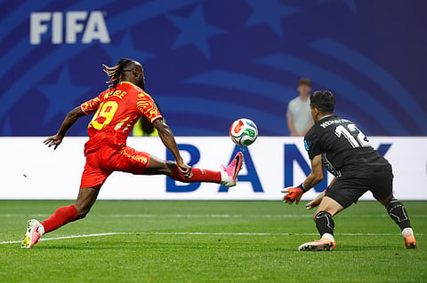 Congo's Fiston Mayele (19) scores their second goal against Uzbekistan goalkeeper Abduvohid Nematov (12) during the World Cup Group K soccer match between DR Congo and Uzbekistan in Atlanta, Saturday, June 27, 2026.