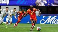 (AP Photo/Erik S. Lesser) : Congo's Yoane Wissa (20) kicks for a penalty kick goal during the World Cup Group K soccer match between DR Congo and Uzbekistan in Atlanta, Saturday, June 27, 2026.
