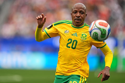 South Africa's Khuliso Mudau (20) goes for the ball during the World Cup round of 32 soccer match 