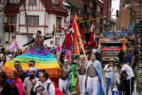 People march during the annual Pride parade in Bogota, Colombia, Sunday, June 28, 2026. 