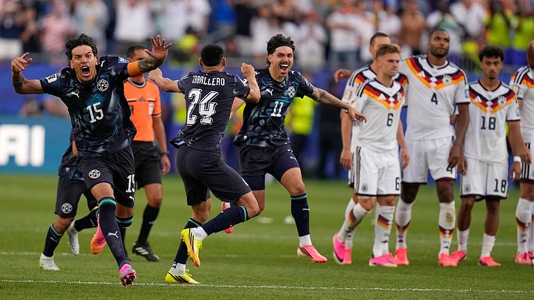 Paraguay's Gustavo Gomez celebrates after winning the World Cup round of 32 soccer match between Germany and Paraguay in Foxborough. - AP Photo/Charles Krupa