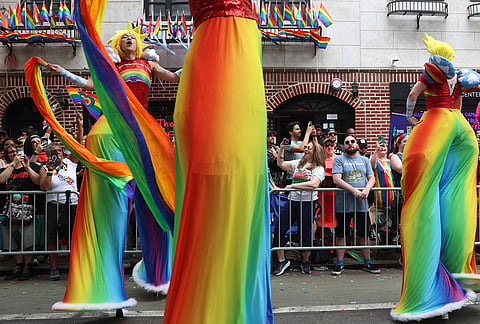 Parade-goers attend the NYC Pride March near the Stonewall Inn, in New York. 