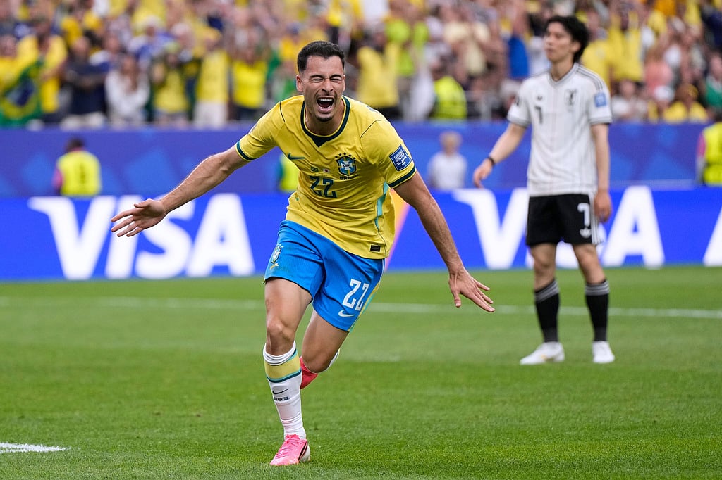 Brazils Gabriel Martinelli (22) celebrates after scoring his sides second goal during the World Cup round of 32 soccer match between Brazil and Japan in Houston