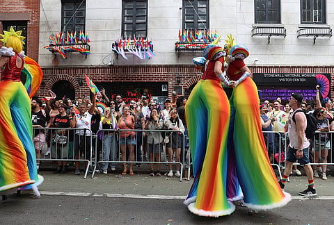 Parade-goers attend the NYC Pride March near the Stonewall Inn, Sunday, June 28, 2026 in New York. 