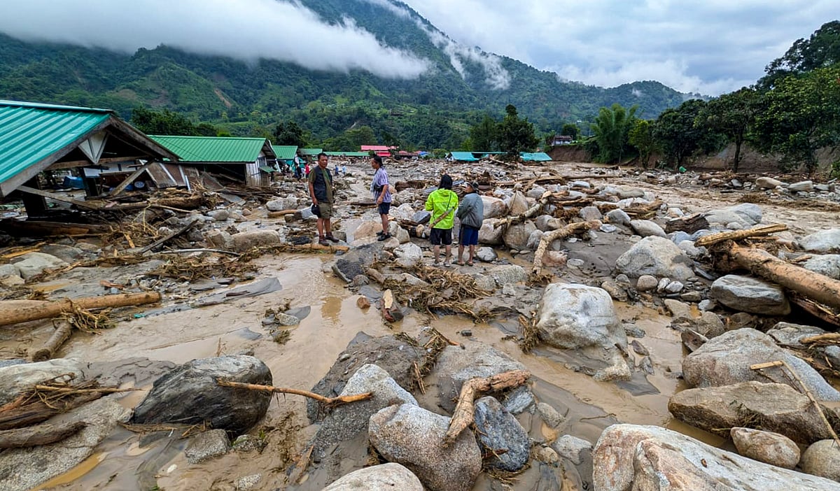 Keyi Panyor: People look at the debris scattered after a landslide and flash floods near the NEEPCO project colony, Keyi Panyor district, Arunachal Pradesh, Wednesday, June 24, 2026. - PTI