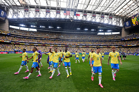 Brazil team pose before the World Cup round of 32 soccer match between Brazil and Japan in Houston
