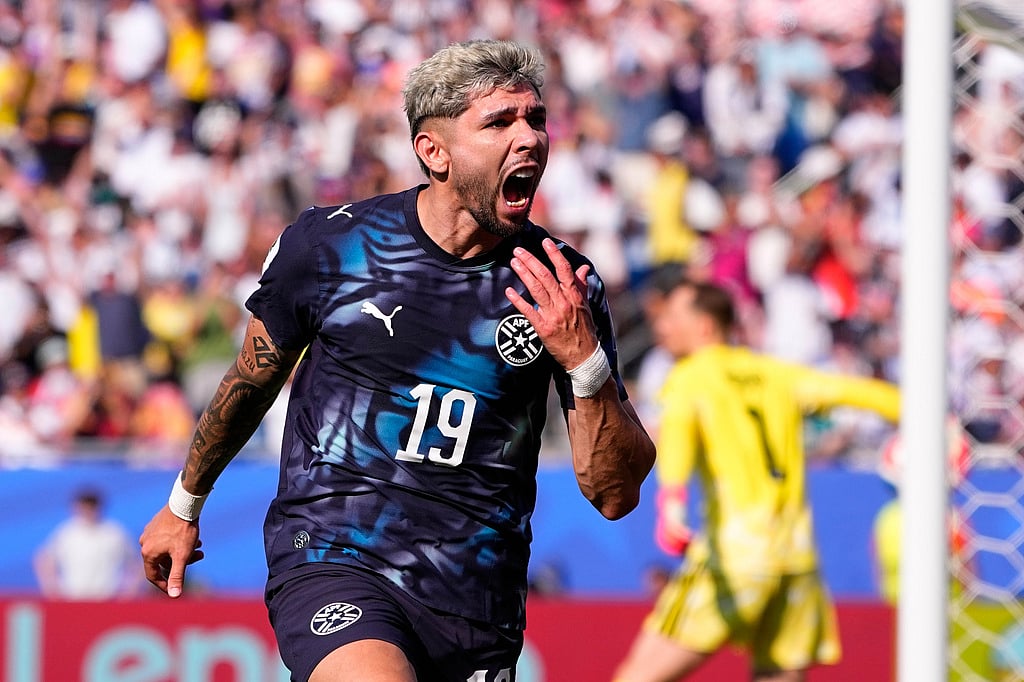 Paraguays Julio Enciso (19) celebrates after scoring his sides opening goal during the World Cup round of 32 soccer match between Germany and Paraguay in Foxborough