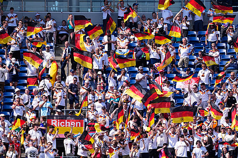 Germany supporters cheer before the World Cup round of 32 soccer match between Germany and Paraguay in Foxborough