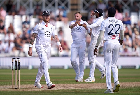 England's Ben Stokes, left, celebrates after Gus Atkinson takes the wicket of New Zealand's Will O'Rourke on day four of the Third cricket Test between England and New Zealand in Nottingham, England, Sunday, June 28, 2026. 