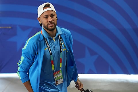 Brazil's Neymar arrives at the stadium ahead the World Cup round of 32 soccer match between Brazil and Japan in Houston