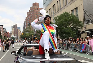 | Photo: AP/Pamela Smith : Peppermint, one of the official Grand Marshals for the 2026 NYC Pride March, salutes to parade-goers, Sunday, June 28, 2026 in New York.
