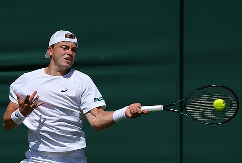 Felix Gill of Britain plays a forehand against Rafael Jodar of Spain in their first round men's singles match at the Wimbledon Tennis Championships in London, Monday, June 29, 2026.