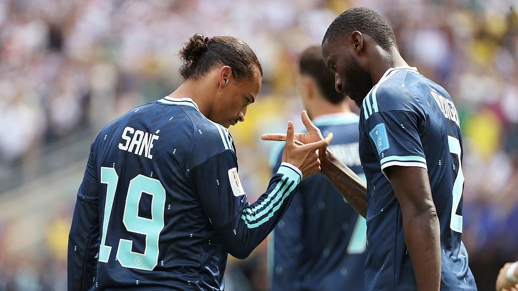 Germany's Leroy Sane (19) celebrates after scoring his side's first goal against Ecuador with Germany's Antonio Ruediger (2) during the World Cup Group E soccer match in East Rutherford. - AP Photo/Pamela Smith