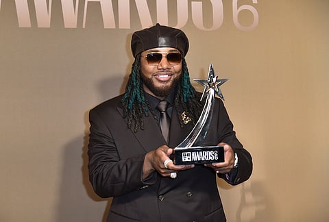Leon Thomas, winner of the award for best male R&B/pop artist, poses in the press room during the BET Awards on Sunday, June 28, 2026, at the Peacock Theater in Los Angeles. 