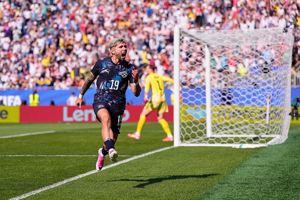 Paraguays Julio Enciso (19) celebrates after scoring his sides opening goal during the World Cup round of 32 soccer match between Germany and Paraguay in Foxborough