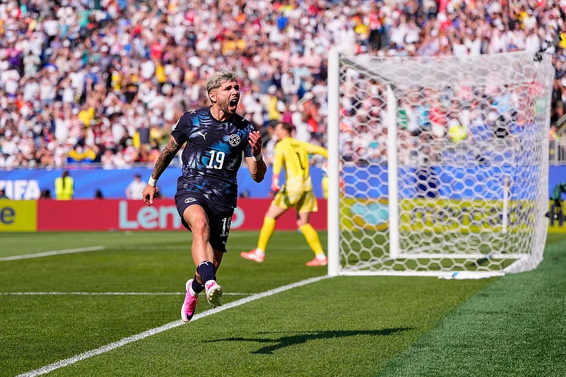 Paraguays Julio Enciso (19) celebrates after scoring his sides opening goal during the World Cup round of 32 soccer match between Germany and Paraguay in Foxborough