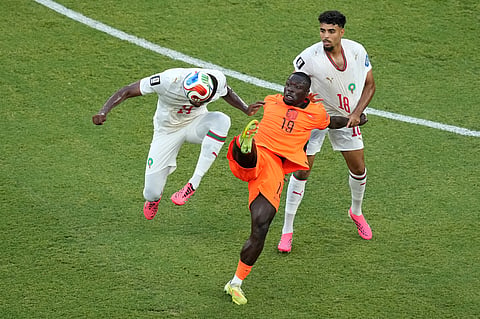 Morocco's Issa Diop (14) heads the ball against Netherlands' Brian Brobbey (19) during the World Cup round of 32 soccer match between the Netherlands and Morocco in Guadalupe, near Monterrey, Mexico, Monday, June 29, 2026.