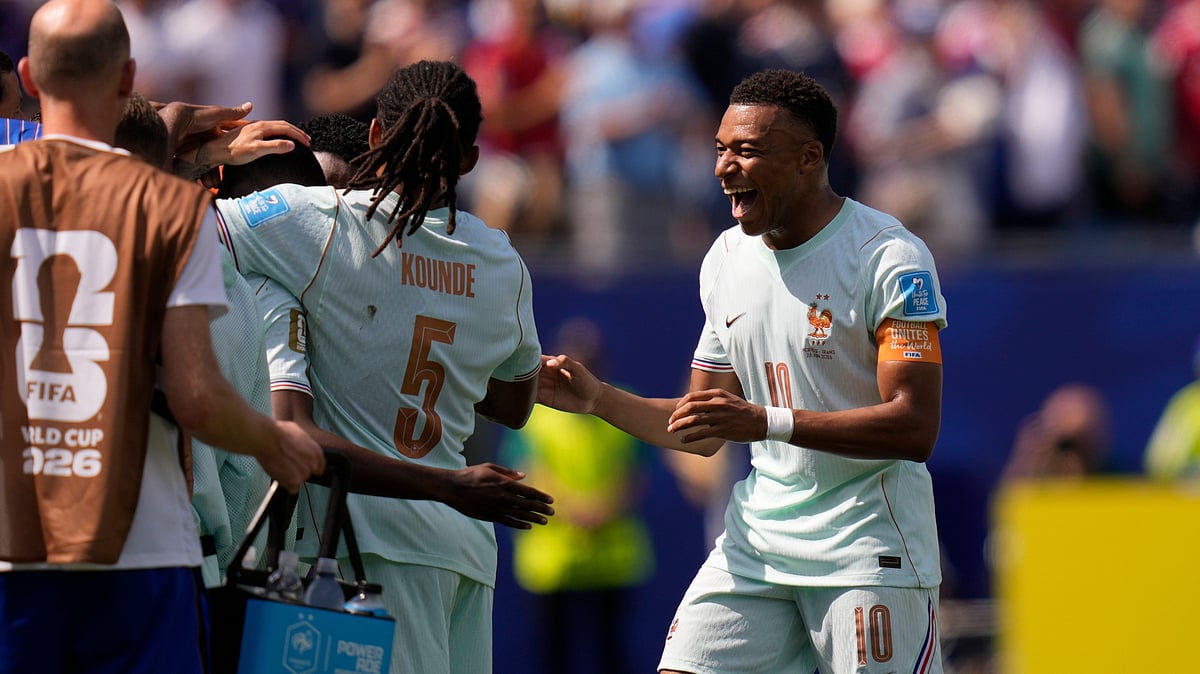 France's Kylian Mbappe (10) celebrates his team's second goal during the World Cup Group I soccer match - AP