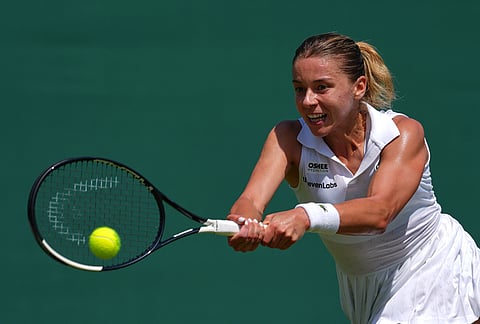 Maja Chwalinska of Poland returns the ball during the women's singles match at the Wimbledon Tennis Championships in London, Monday, June 29, 2026.