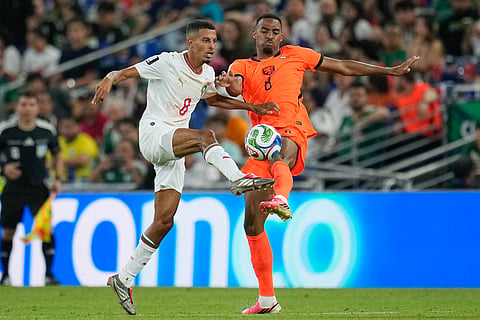 Netherlands' Ryan Gravenberch (8) and Morocco's Azzedine Ounahi (8) battle for the ball during the World Cup round of 32 soccer match between the Netherlands and Morocco in Guadalupe, near Monterrey, Mexico, Monday, June 29, 2026. 