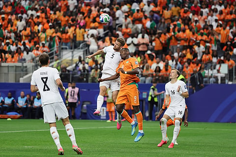 Norway's Kristoffer Ajer (3) battles for a header with Ivory Coast's Ange-Yoan Bonny (9) during the FIFA World Cup