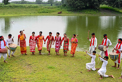 Tribals participate in an event to observe 'Hul Diwas', in Nadia, West Bengal.