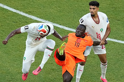 Morocco's Issa Diop (14) heads the ball against Netherlands' Brian Brobbey (19) during the World Cup round of 32 soccer match between the Netherlands and Morocco in Guadalupe, near Monterrey, Mexico, Monday, June 29, 2026.
