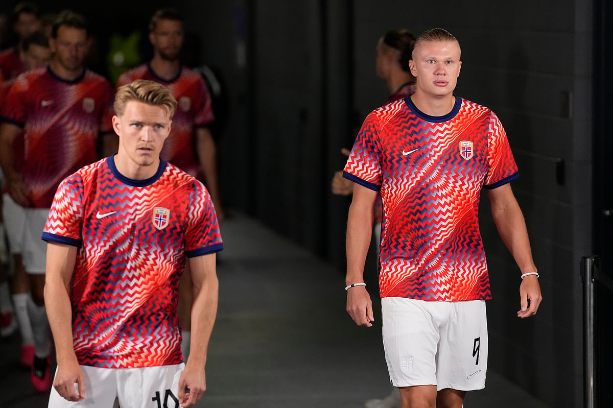 Norway's Erling Haaland (9) enters with teammates the pitch before the World Cup round of 32 soccer match - AP