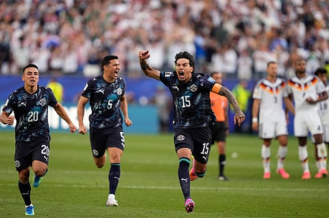 Paraguay's Gustavo Gomez celebrates after winning the World Cup round of 32 soccer match between Germany and Paraguay in Foxborough
