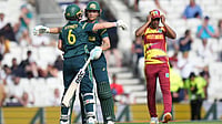 (AP Photo/Alastair Grant) : Australia's Beth Mooney, left, and Australia's Ashleigh Gardner celebrates after winning the Women's T20 Cricket World Cup semifinal against West Indies in London, Tuesday, June 30, 2026