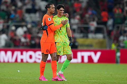 Netherlands' Virgil van Dijk (4) congratulates Morocco goalkeeper Yassine Bounou (1) after a Morocco win during the World Cup round of 32 soccer match between the Netherlands and Morocco in Guadalupe, near Monterrey, Mexico, Monday, June 29, 2026.
