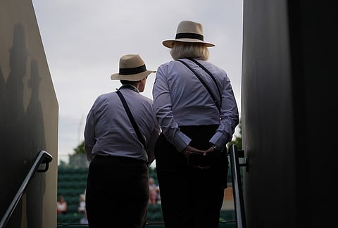 Stewards work on court 3 during day one of the Wimbledon Tennis Championships in London, Monday, June 29, 2026. 